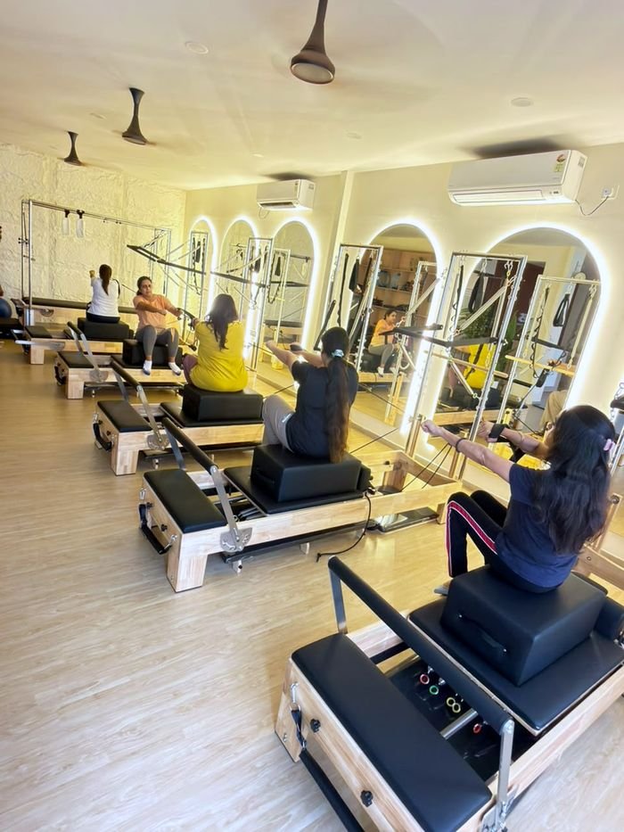 A reformer class in progress at Liv Pilates